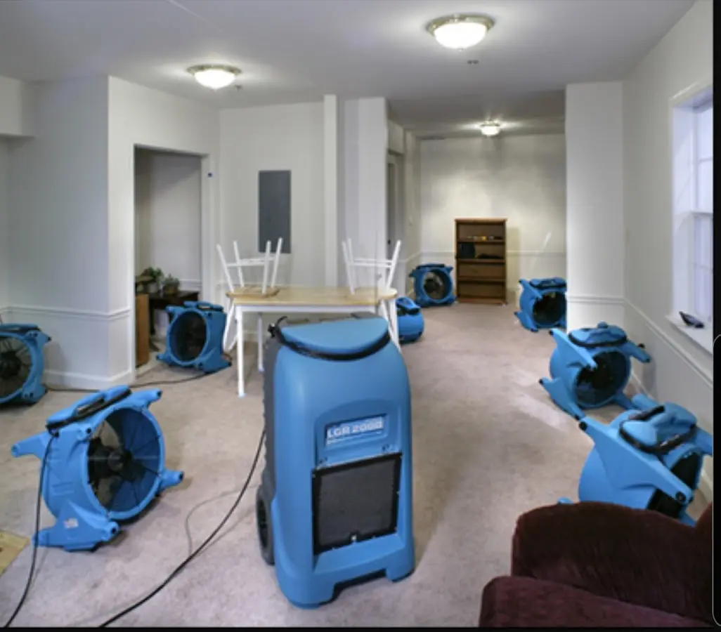 Air movers and dehumidifier setup for Water Extraction & Removal in Tice